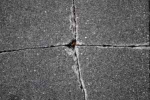 Can You Stain Cracked Concrete? What to Know Before You Start